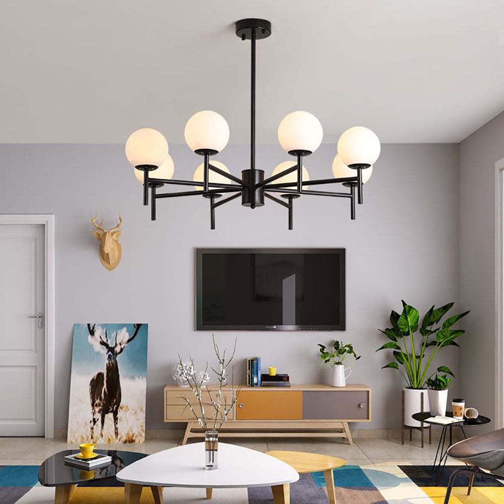 Black Alessio globe pendant light in living room