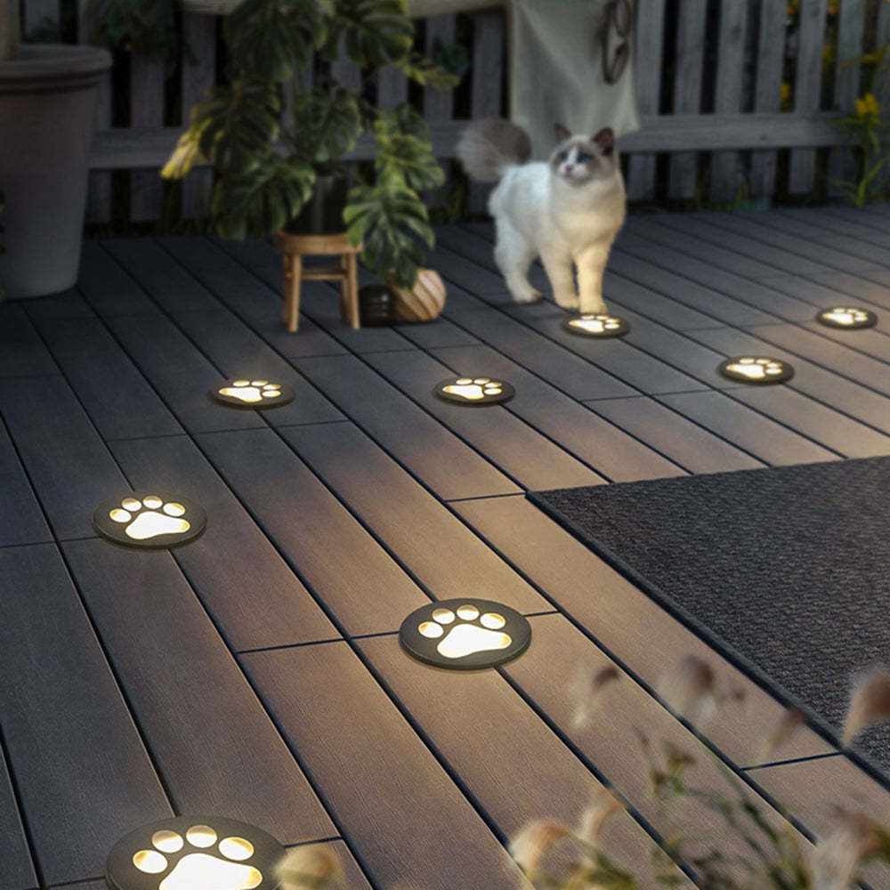 Outdoor deck with Minori cat paw lights and a cat