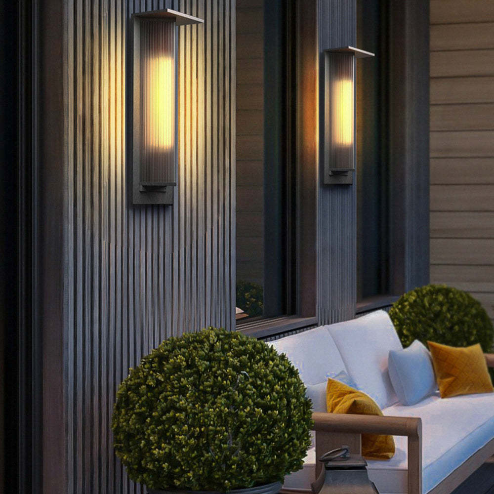 Orr modern outdoor wall lamp illuminating patio at night