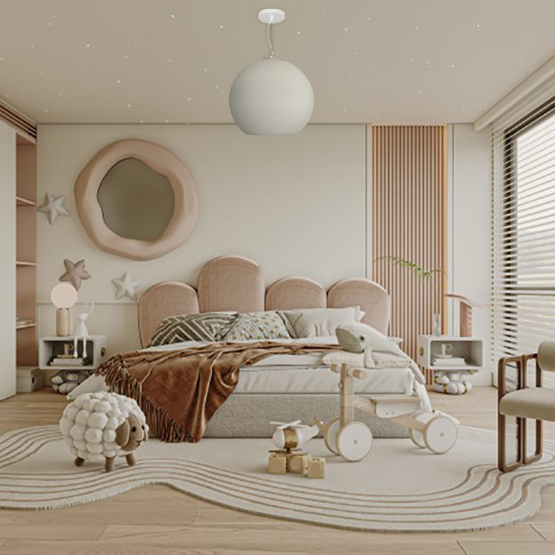 Byers pendant light in kids room, ball shape fixture.