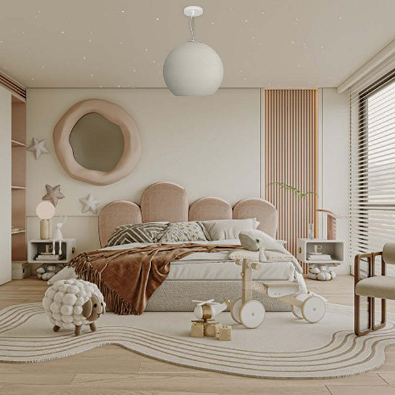 Byers pendant light in kids room, ball shape fixture.