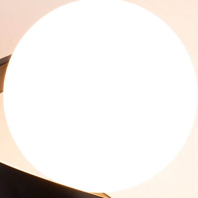 Glowing globe glass lampshade, Louise wall lamp detail