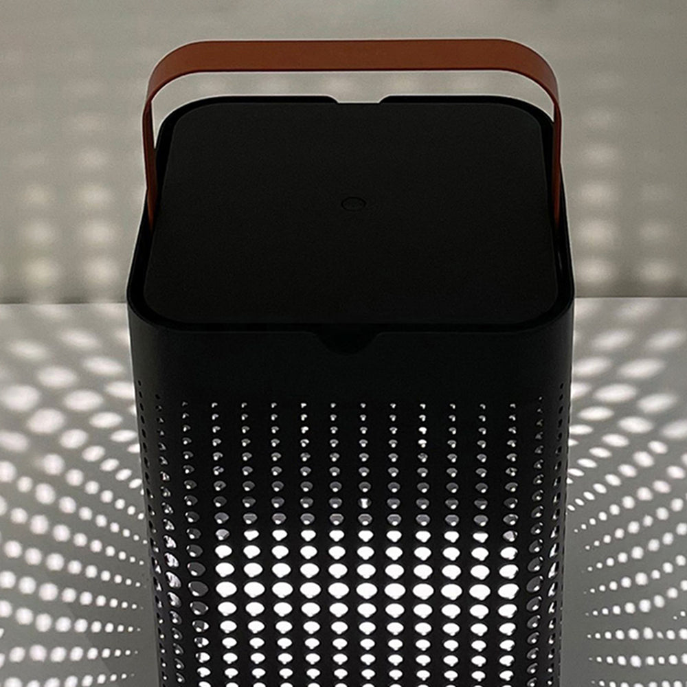 Orr solar floor lamp with lattice shadow pattern.