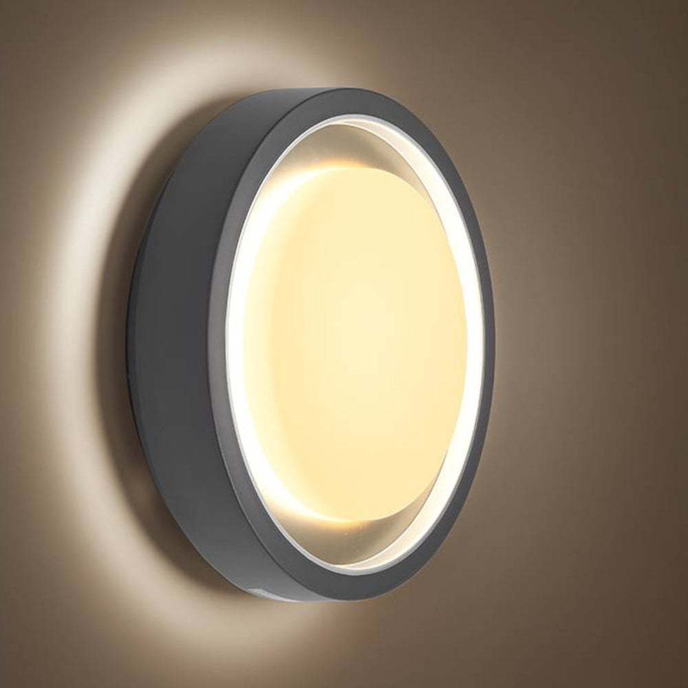 Orr Modern Circular Outdoor Wall Lamp illuminating