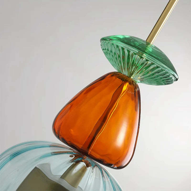 Close-up of Hailie glass pendant light in vibrant colors