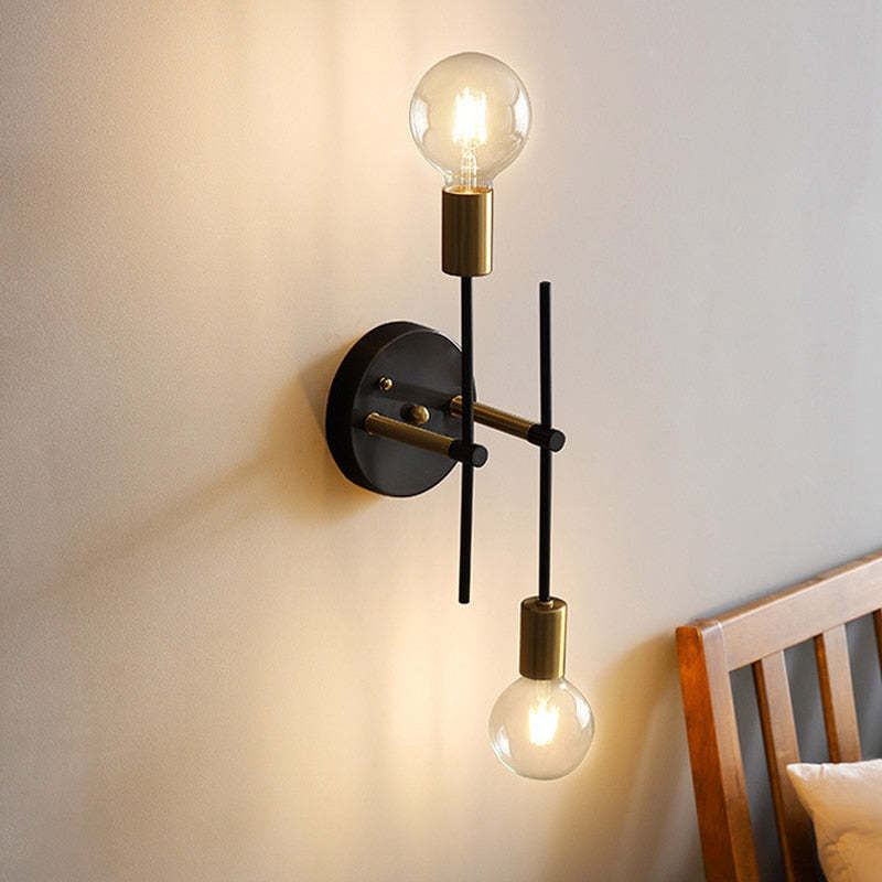 Modern Valentina wall light fixture, gold and black, modern design