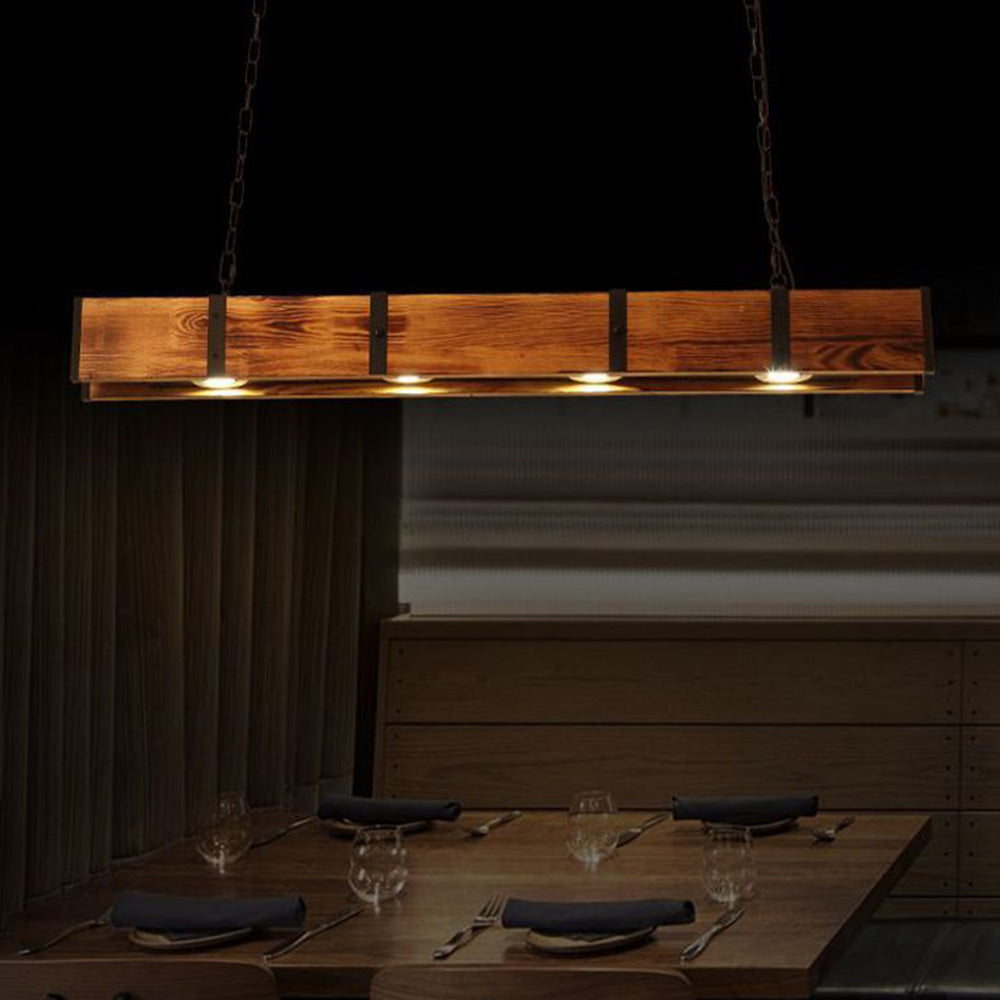 Alessio wood pendant light over restaurant table, vintage lighting