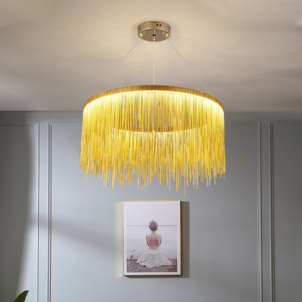 Gold Art Deco pendant light over artwork