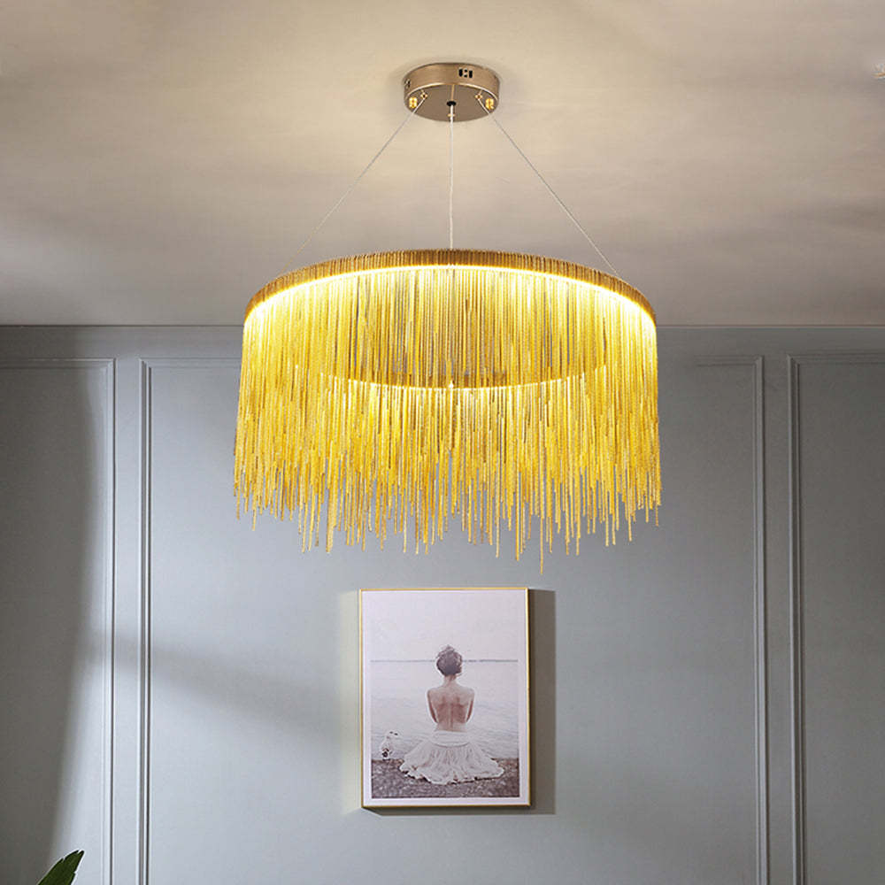 Gold Art Deco pendant light over artwork