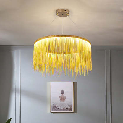Gold Art Deco pendant light over artwork