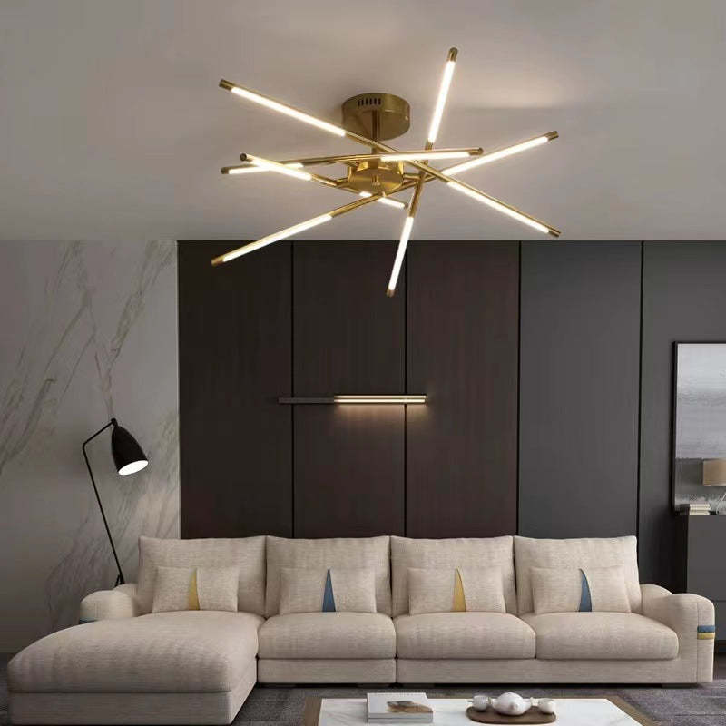 Modern gold ceiling light fixture above sofa