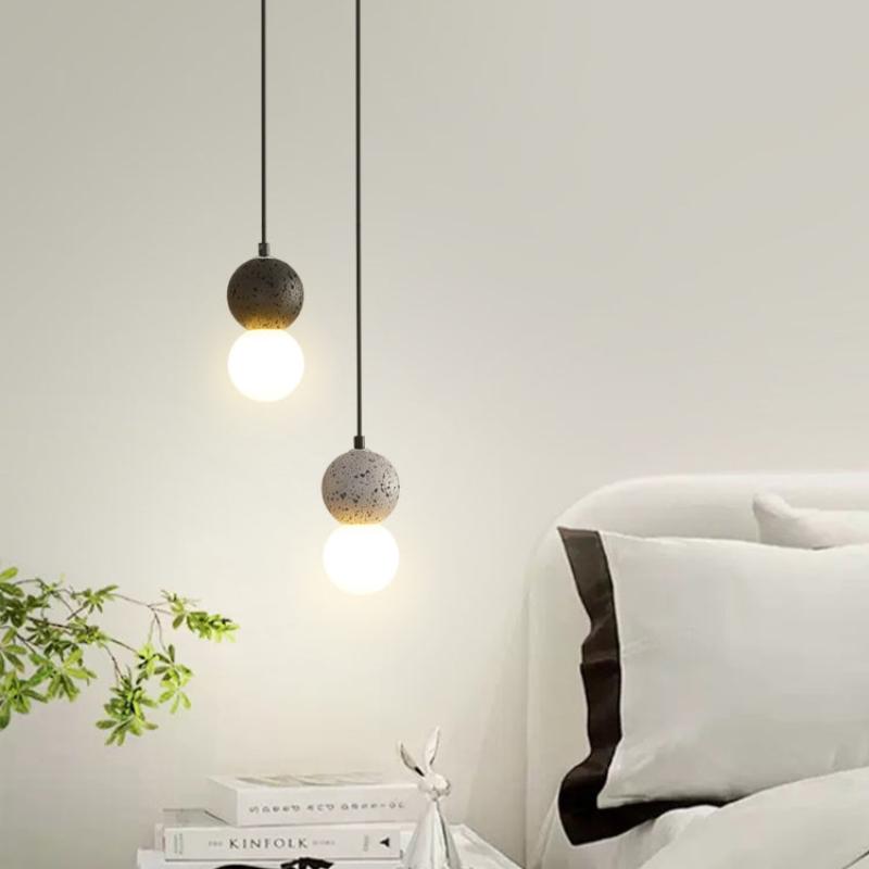 Valentina pendant lights over a bed