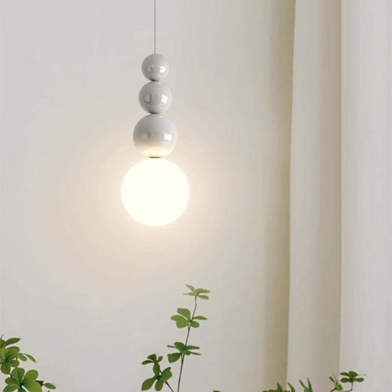 Modern pendant light with stacked orb design