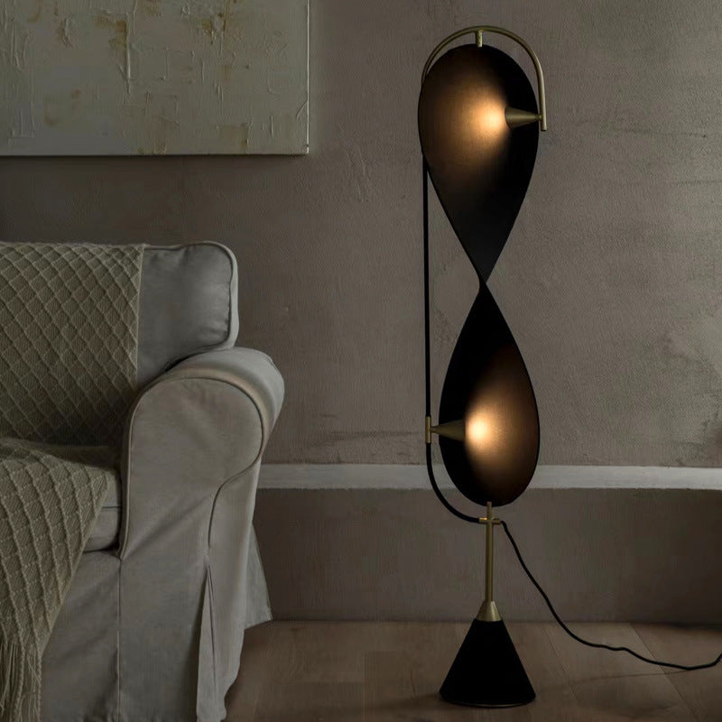 Salgado Floor Lamp illuminating living room