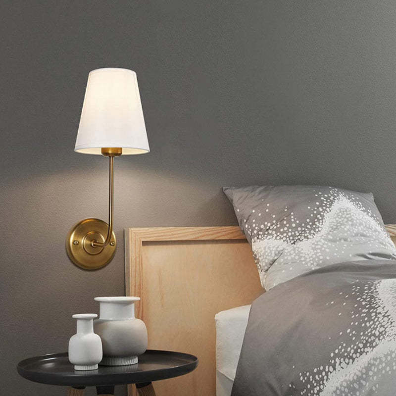 Bedroom wall lamp with fabric shade, brass finish
