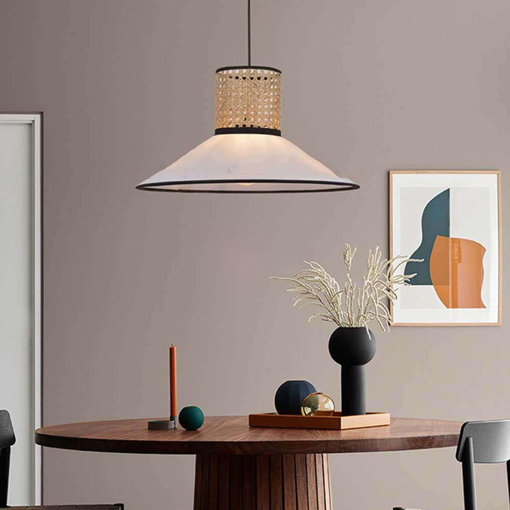 Ritta Rattan Pendant Light over a dining table.