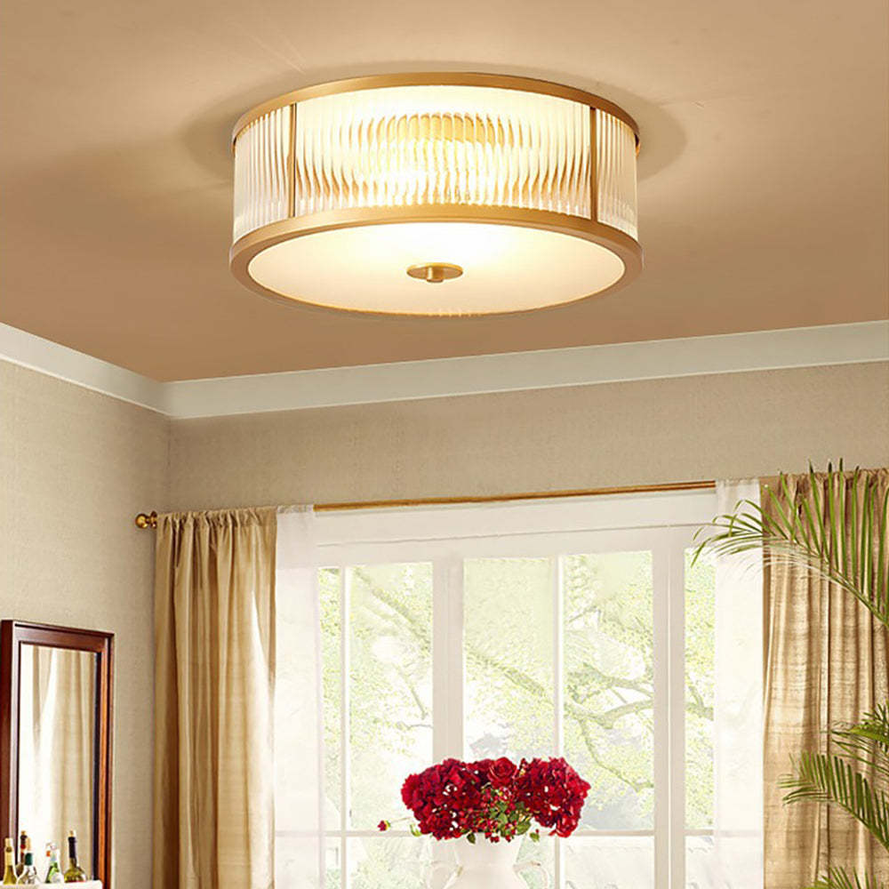 Alessio gold flush mount ceiling light in bedroom