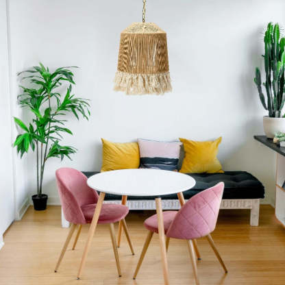 Ritta Pendant Light illuminating a dining room