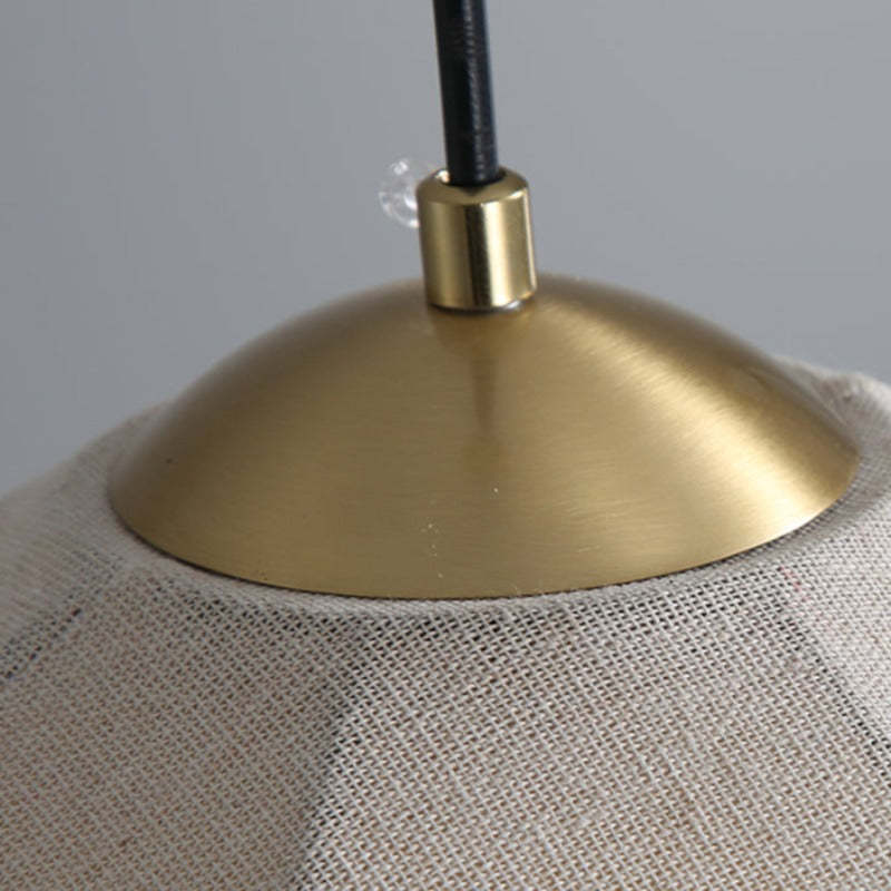 Close-up: Boho pendant light, fabric and metal.