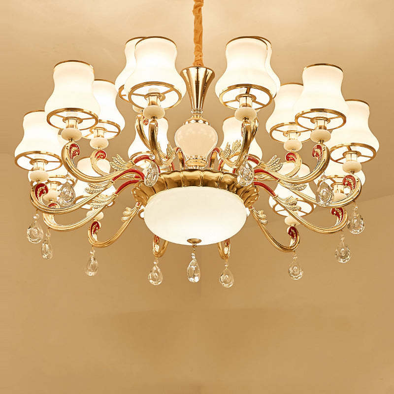 Alessio retro pendant light with gold finish and crystal drops.