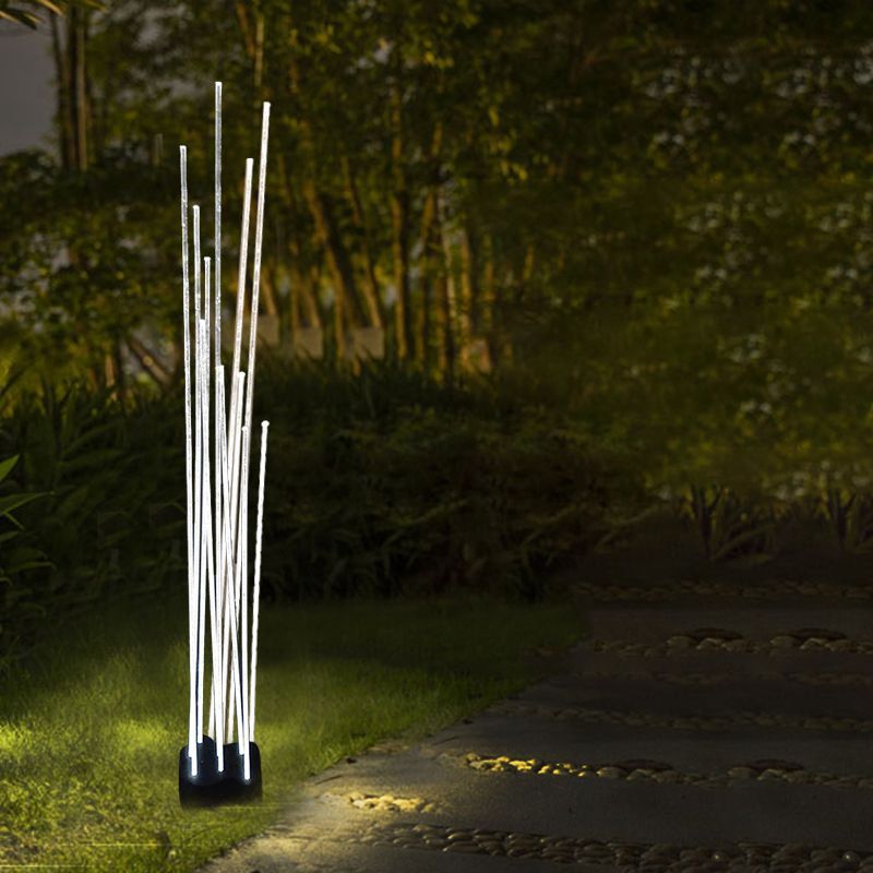 Riley Outdoor LED Ground Light illuminating pathway