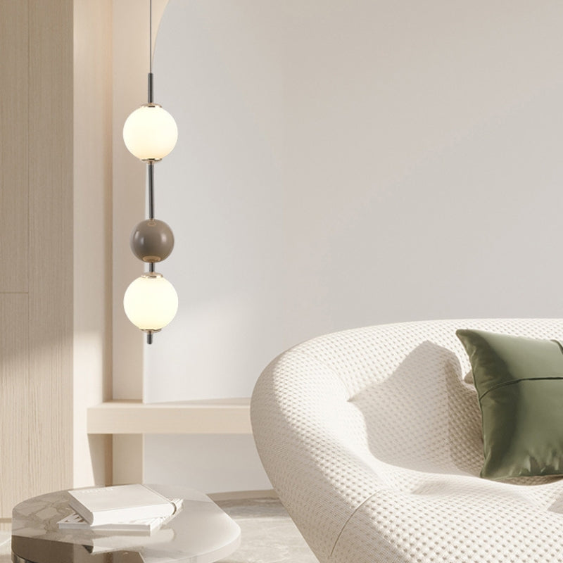 Modern Valentina pendant light in a contemporary living room setting