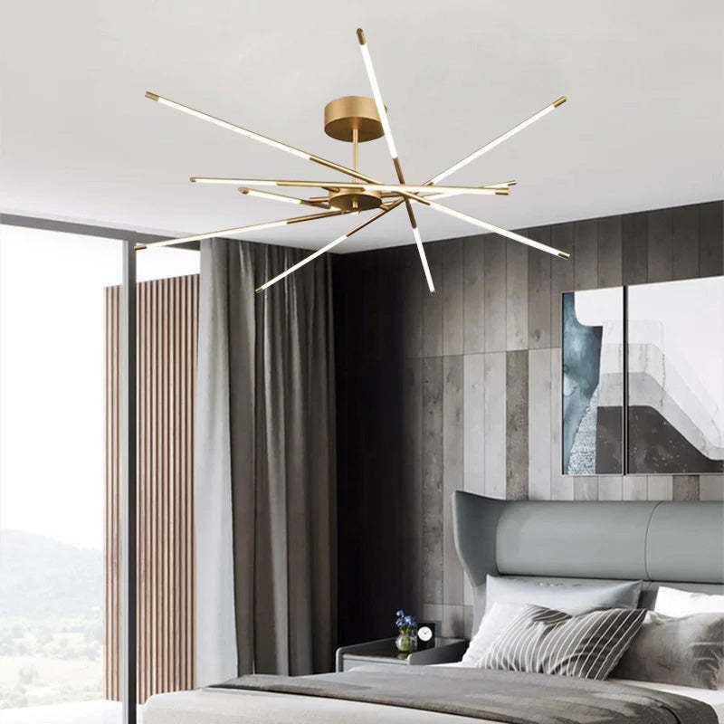 Modern gold starburst ceiling light in bedroom