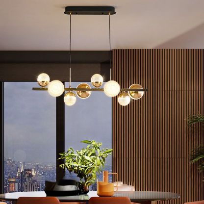 Modern glass bubble pendant light in dining room.
