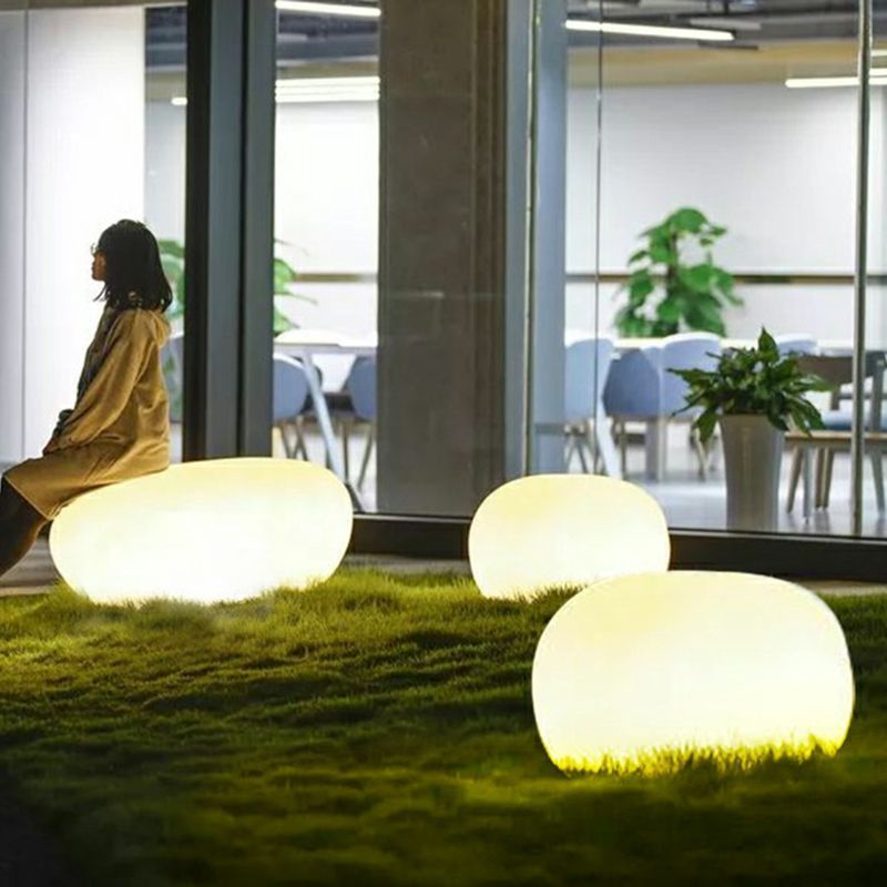Las Sola Pena stone outdoor lights on lawn Pena Modern Stone Shaped Rechargeable Outdoor Light
