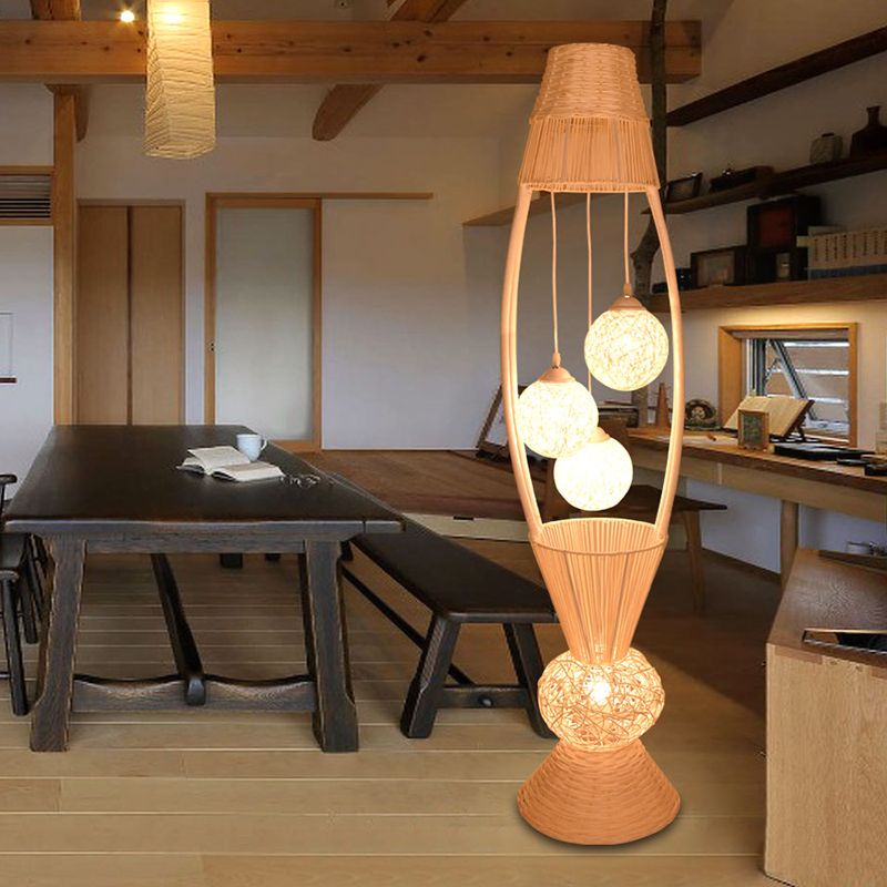 Muto bamboo floor lamp in a rustic dining room setting