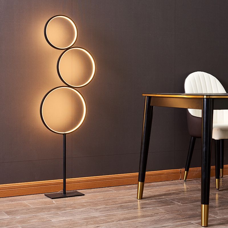 Arisha Nordic Ring Floor Lamp near modern dining table.