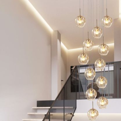 Glass ball chandelier in modern staircase