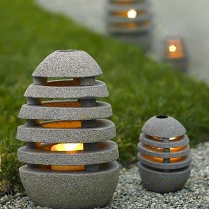 Pena Stone Outdoor Lights illuminating a garden