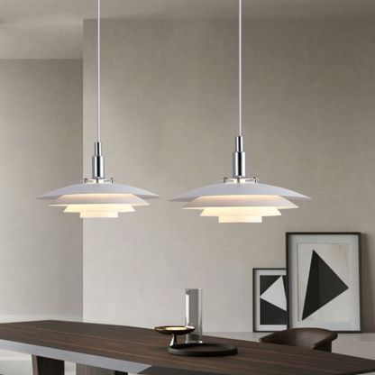White modern pendant lights over dining table