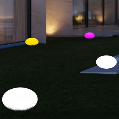 Modern outdoor ground lights in a garden