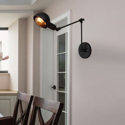 Brady black metal adjustable wall lamp for bedroom lighting