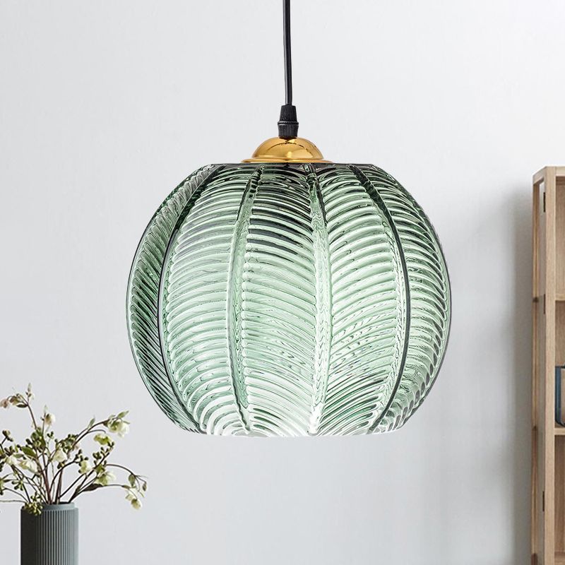 Green glass ribbed pendant light, Nordic style.