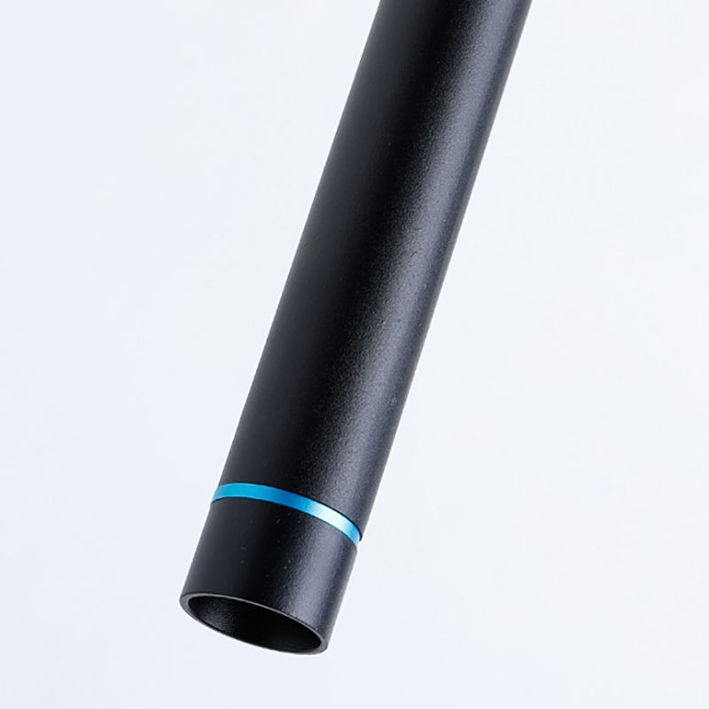 Close-up of black Edge cylinder pendant light.