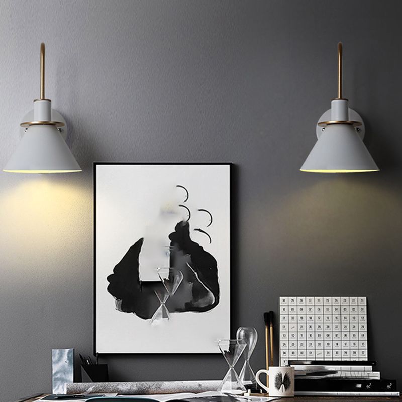 Morandi wall lamps illuminating modern interior with artwork