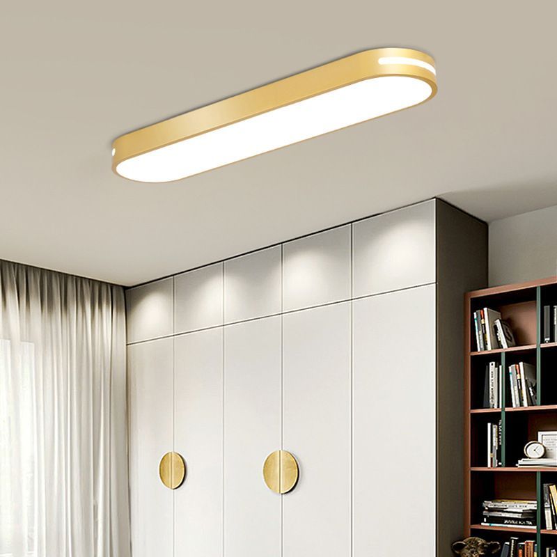 Gold Quinn Oval LED Ceiling Light in bedroom