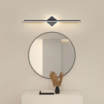 Leigh LED vanity light above round mirror in bathroom.