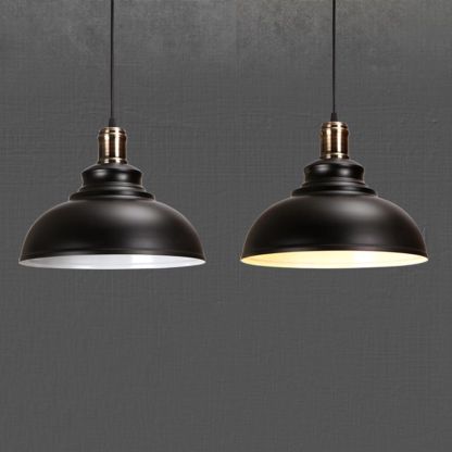 Black Cooley pendant lights, industrial metal dome.