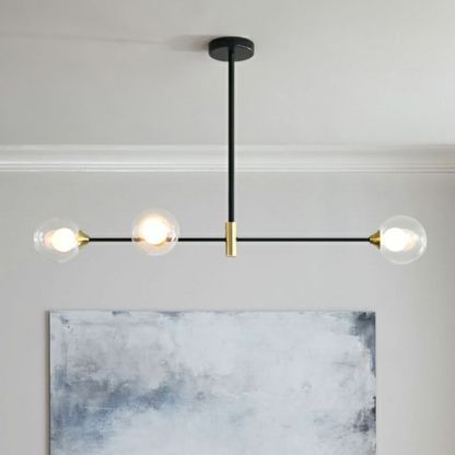 Modern three-light pendant with glass globe shades