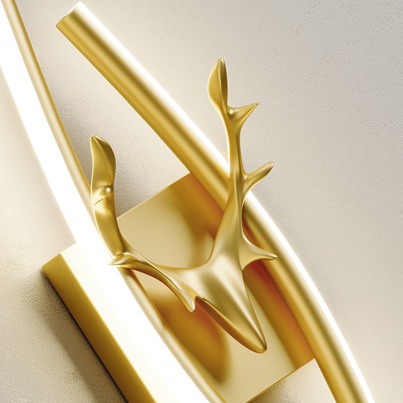 Gold Alana LED Wall Lamp, deer head design. Modern vanity lighting.