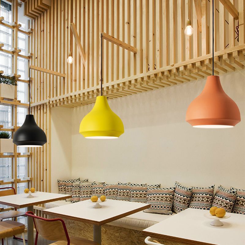 Morandi pendant lights in a modern dining room.