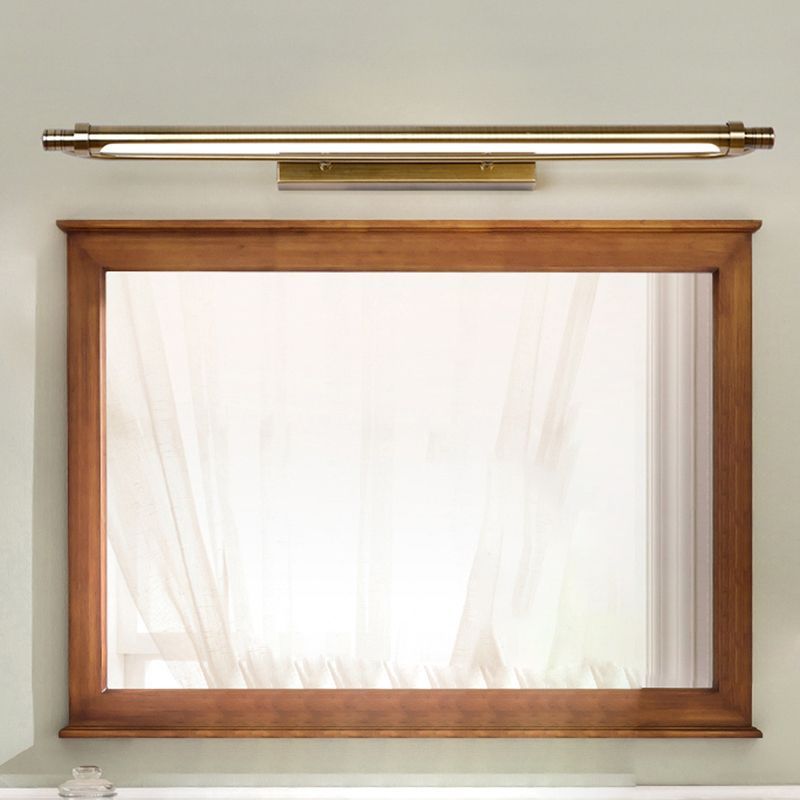 Leigh gold linear LED vanity light above mirror