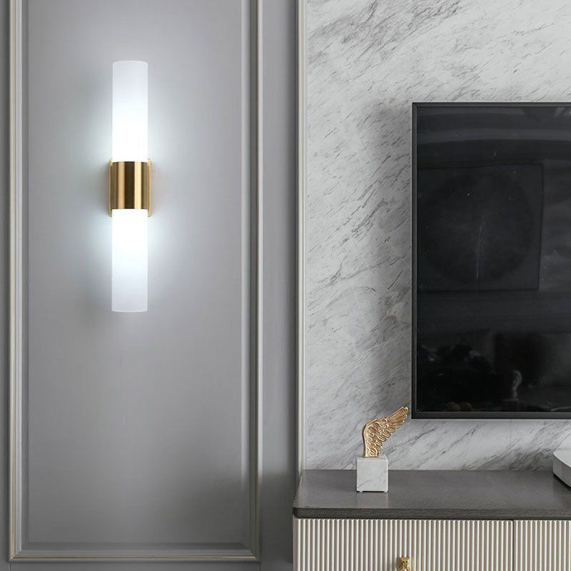 Modern Double Headed Wall Lamp - Gold and Glass, illuminating