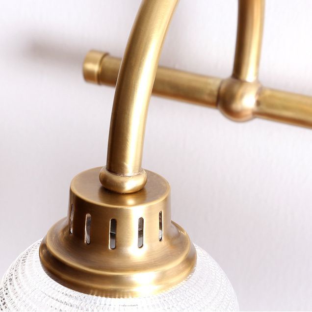 Lottie Prismatic brass and glass wall lamp detail