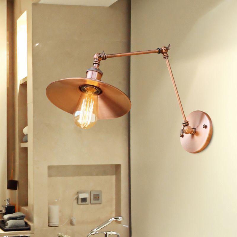 Copper Alessio adjustable wall lamp for bedroom lighting.