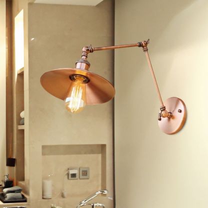 Copper Alessio adjustable wall lamp for bedroom lighting.